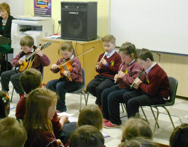 Young musicians from Second Class play a selection of melodies on Proclamation Day 600