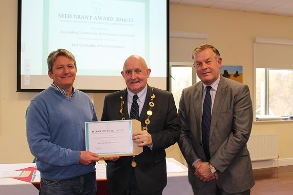 Derry O Donnell on behalf of Borrisoleigh Community Development Association accepting a cheque and certificate from Kieran O Hanlon, Mayor of Limerick and Pat Quinlan, CEO Milford Care Centre